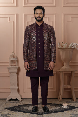 Men’s plum brocade Indo-Western with metallic embroidery and antique buttons.