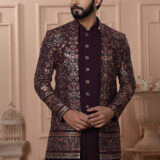 Men’s plum brocade Indo-Western with metallic embroidery and antique buttons.
