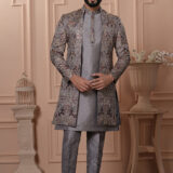 Men’s silver-grey brocade Indo-Western with multicolor embroidery and sequins.