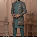 Men’s teal green embroidered Indo-Western jacket set with floral motifs and sequins.