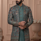 Men’s teal green embroidered Indo-Western jacket set with floral motifs and sequins.