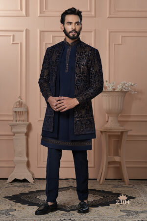 Men’s navy blue Indo-Western jacket set with golden zari embroidery.