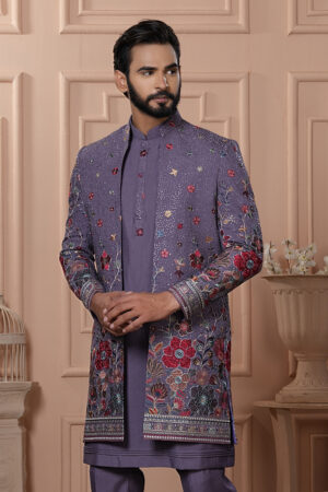 Men’s lavender Indo-Western with multicolor floral embroidery and detailed borders.