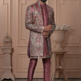 Men’s maroon Indo-Western with intricate multicolor embroidery on silk base.