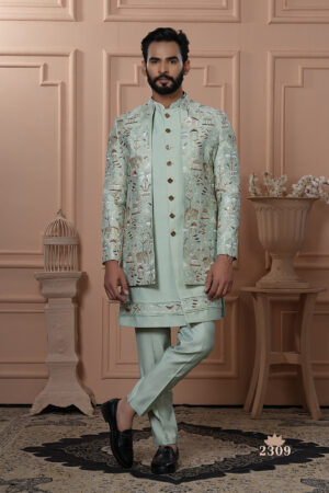 Men’s pastel green Indo-Western with embroidered royal motifs and detailed embellishments.