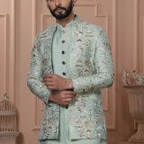 Men’s pastel green Indo-Western with embroidered royal motifs and detailed embellishments.