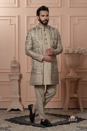 Men’s beige Indo-Western outfit with floral embroidery and mirror work jacket.