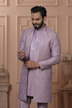 Men’s lavender Indo-Western outfit with mirror work and embroidered jacket.