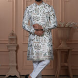 Men’s ivory Navabi with nature-inspired motifs of trees, deer, and birds in green and gold embroidery.