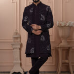 Men’s deep plum open Indo-Western outfit with embroidered jacket and matching kurta-pants.