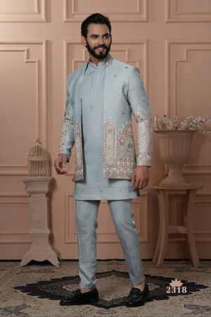 Men’s powder blue Indo-Western with embroidered jacket, kurta, and pants.
