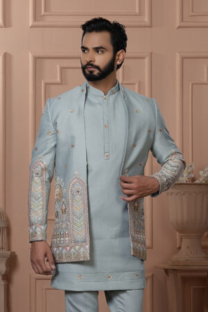 Men’s powder blue Indo-Western with embroidered jacket, kurta, and pants.
