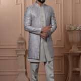 Men’s silver-grey Indo-Western with embroidered jacket, paired with matching kurta and trousers.