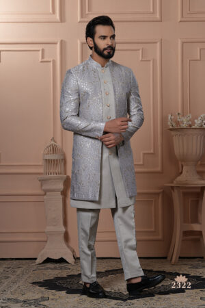 Men’s silver-grey Indo-Western with embroidered jacket, paired with matching kurta and trousers.