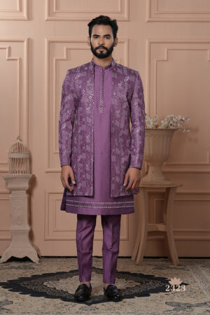 Men’s lavender Indo-Western with embroidered and mirror work jacket, paired with kurta and trousers.