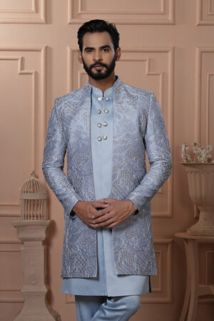 Men’s powder blue Indo-Western outfit with embroidered jacket and metallic buttoned kurta.