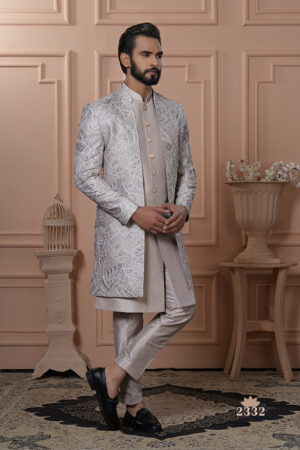 Men’s champagne beige Indo-Western outfit with silver embroidered jacket and matching kurta set.