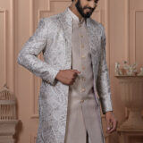Men’s champagne beige Indo-Western outfit with silver embroidered jacket and matching kurta set.