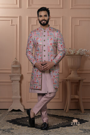 Men’s pastel pink Indo-Western outfit with multicolor embroidered jacket and matching kurta set.