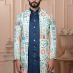 Men’s ivory Indo-Western jacket with multicolor geometric prints paired with a royal blue kurta set.
