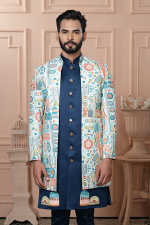 Men’s ivory Indo-Western jacket with multicolor geometric prints paired with a royal blue kurta set.