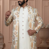 Man wearing cream Indo-Western outfit with pastel embroidered long jacket.