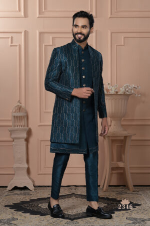 Man wearing teal Indo-Western outfit with a textured embroidered long jacket.
