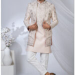 Pastel pink Indo-Western suit with silver embroidery and mandarin collar for men.