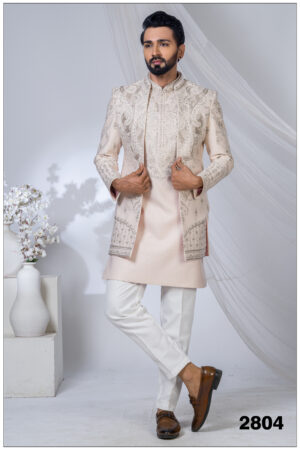 Pastel pink Indo-Western suit with silver embroidery and mandarin collar for men.