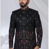Black Jodhpuri suit with multicolor embroidery featuring peacock and elephant motifs.