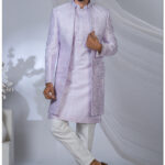 Lavender Indo-Western suit with intricate embroidery of floral and heritage motifs.