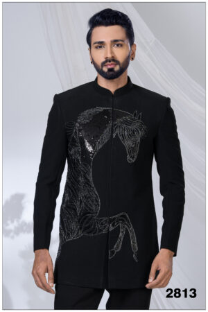 Man wearing a black Jodhpuri suit with an embroidered sequined horse design and mandarin collar.