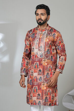Man wearing a multicolored kurta with traditional miniature painting motifs and mirror work, paired with white pants—an artistic, festive, ethnic outfit.