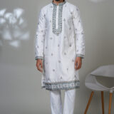 Men’s white kurta with blue-grey embroidery and detailed hem