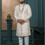 Ivory malai silk sherwani with golden zari and floral embroidery for groom