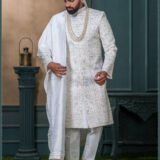Ivory silk sherwani with self-tone zari and sequin embroidery for groom