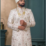 Ivory silk groom sherwani with peacock and elephant zari embroidery
