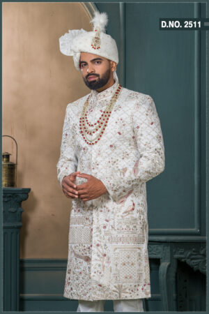 Ivory silk groom sherwani with architectural and floral zari embroidery