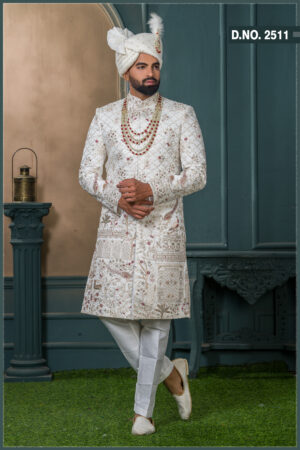 Ivory silk groom sherwani with architectural and floral zari embroidery