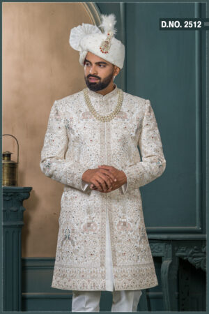 Ivory brocade groom sherwani with elephant and floral zari embroidery
