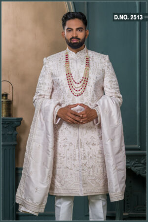 Ivory silk groom sherwani with matching dupatta and intricate thread embroidery