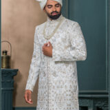Ivory floral embroidered sherwani with golden zari work for groom wedding wear