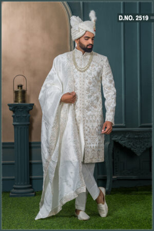 Ivory floral embroidered sherwani with golden zari work for groom wedding wear