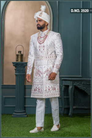 Ivory sherwani with heritage embroidery featuring royal motifs of elephants and musicians for wedding wear.