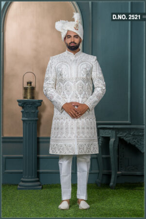 Ivory sherwani with silver and pastel embroidery featuring royal arch motifs, perfect for wedding wear.